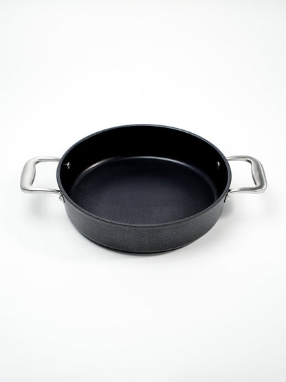 SKK Lightweight round serving pan without lid showing non-stick interior