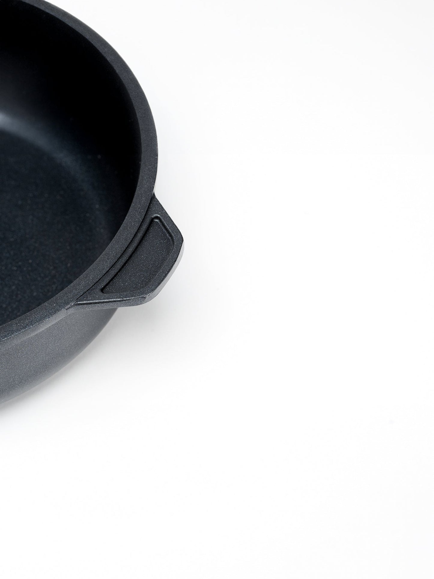 SKK Classic deep sauté pan, close-up detail of titanium-reinforced non-stick interior