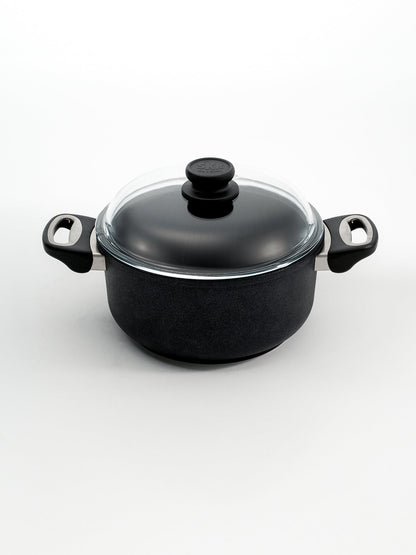 SKK Classic hand-cast tall cooking pot with glass lid, angled view — Made in Germany